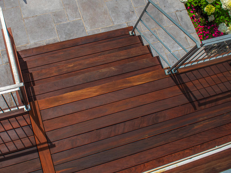 Factory Finishing Deck Stairs by Rex Lumber